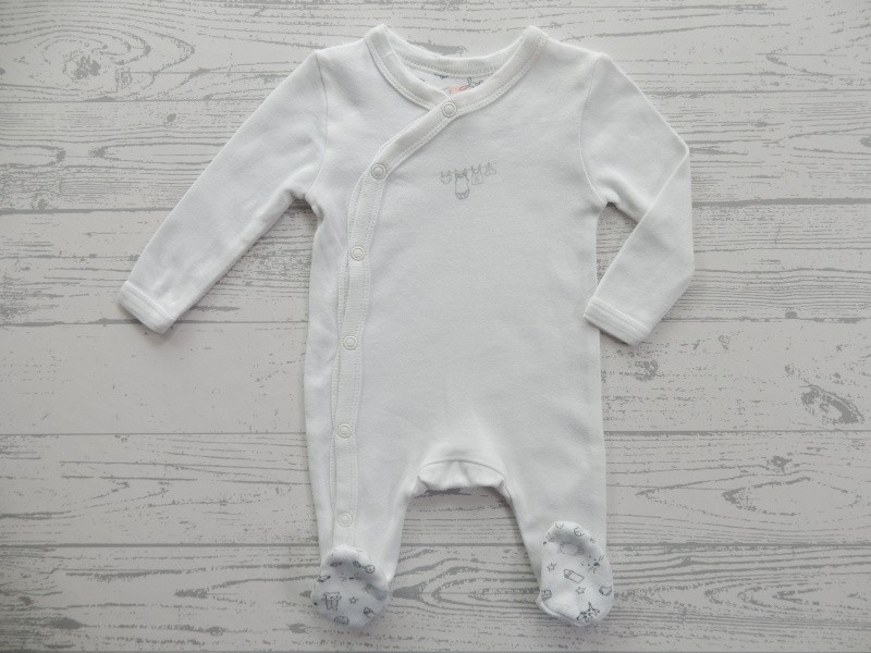 Hema newborn jumpsuit off white zwart dessin doodles maat 44